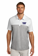 Load image into Gallery viewer, TBT Logo Travis Mathew Oceanside Blocked Polo (Multiple Color Options)
